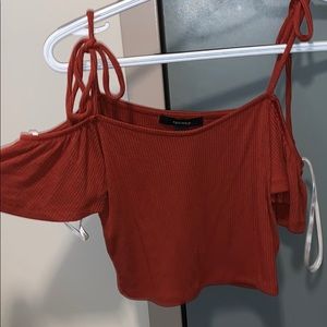 Rust colored off the shoulder crop top